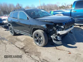 2019 Jeep Cherokee Latitude Plus with VIN 1C4PJMLX5KD369346, listed as a IAAI auction lot 41407489 with 50,898 mi miles. Bid and sale history available at carsss.com. Image 1.