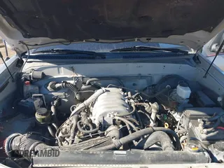 2004 Toyota Tundra SR5 with VIN 5TBDT44154S455442, listed as a IAAI auction lot 42081700 with 245,608 mi miles and . Bid and sale history available at DreamBid. Image 10.