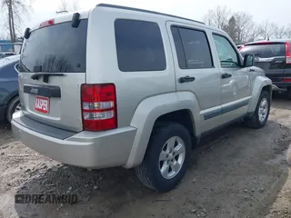 2009 Jeep Liberty Sport with VIN 1J8GN28K69W512320, listed as a IAAI auction lot 41970015 with 115,443 mi miles. Bid and sale history available at carsss.com. Image 4.