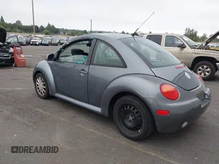 2004 Volkswagen New Beetle Coupe GLS with VIN 3VWCK31CX4M420124, listed as a IAAI auction lot 40259243 with 103,138 mi miles. Bid and sale history available at carsss.com. Image 3.