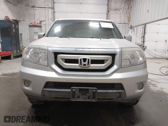 2011 Honda Pilot EX-L with VIN 5FNYF4H66BB029802, listed as a IAAI auction lot 42101545 with 240,127 mi miles and . Bid and sale history available at carsss.com. Image 12.