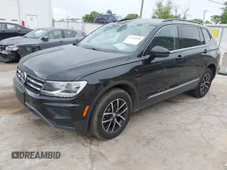 2021 Volkswagen Tiguan SE z VIN 3VV3B7AXXMM101773, wystawiony jako IAAI lot #42358588 z przebiegiem 105 629 mil mil oraz . Historia ofert i sprzedaży dostępna na DreamBid. Obrazek 18.
