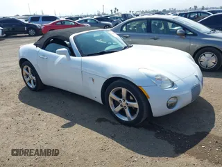 2006 Pontiac Solstice z VIN 1G2MB33B96Y101689, wystawiony jako IAAI lot #41891437 z przebiegiem 108 295 mil mil oraz . Historia ofert i sprzedaży dostępna na DreamBid. Obrazek 1.