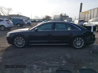 2015 Audi A8 3.0T with VIN WAU3GAFDXFN028244, listed as a IAAI auction lot 41791578 with 149,770 mi miles and . Bid and sale history available at DreamBid. Image 14.