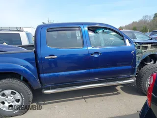 2014 Toyota Tacoma with VIN 3TMLU4EN0EM153558, listed as a IAAI auction lot 41964890 with 140,864 mi miles and . Bid and sale history available at DreamBid. Image 14.