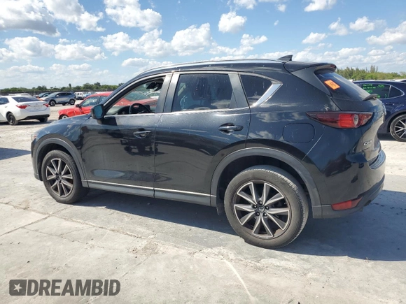 2018 Mazda CX-5 Touring with VIN JM3KFACM0J1408075, listed as a Copart auction lot 50866735 with Not Provided miles and Salvage Title. Bid and sale history available at carsss.com. Image 2.