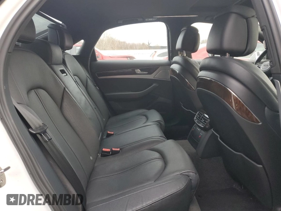 2015 Audi A8 z VIN WAUJGAFD9FN003570, wystawiony jako Copart lot #87642905 z przebiegiem 71 523 mil mil oraz Czysty tytuł • Clean title. Historia ofert i sprzedaży dostępna na DreamBid. Obrazek 10.