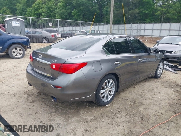 2015 Infiniti Q50 Premium with VIN JN1BV7AP7FM338434, listed as a IAAI auction lot 42158445 with 115,685 mi miles and . Bid and sale history available at DreamBid. Image 4.