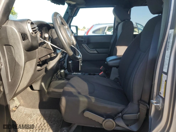 2014 Jeep Wrangler Unlimited Sport with VIN 1C4BJWDG8EL134356, listed as a Copart auction lot 74378874 with 103,318 mi miles and Salvage Title. Bid and sale history available at carsss.com. Image 7.