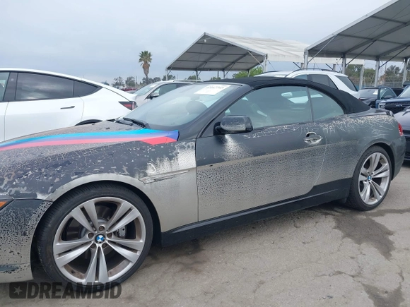 2007 BMW 6 Series 650i with VIN WBAEK13507CN81020, listed as a IAAI auction lot 42167743 with 127,552 mi miles. Bid and sale history available at carsss.com. Image 14.