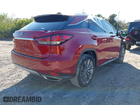 2021 Lexus RX with VIN 2T2JZMAA7MC191660, listed as a IAAI auction lot 41609520 with 45,736 mi miles. Bid and sale history available at carsss.com. Image 4.