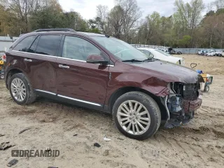 2012 Lincoln MKX with VIN 2LMDJ6JK1CBL14339, listed as a Copart auction lot 52938645 with 135,290 mi miles and Salvage Title. Bid and sale history available at carsss.com. Image 4.