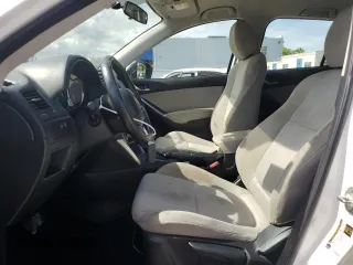 2014 Mazda CX-5 Sport with VIN JM3KE2BE9E0344990, listed as a Copart auction lot 59014145 with 126,905 mi miles and Salvage title. Bid and sale history available at DreamBid. Image 7.