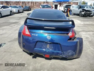 2016 Nissan 370Z z VIN JN1AZ4EH9GM933658, wystawiony jako Copart lot #48760215 z przebiegiem 70 682 mil mil oraz Szkoda całkowita • Salvage title. Historia ofert i sprzedaży dostępna na DreamBid. Obrazek 6.