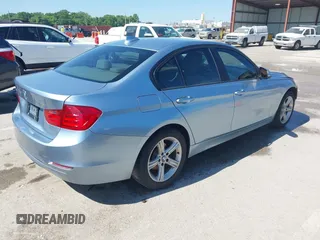 2014 BMW 3 Series 320i xDrive with VIN WBA3C3C59EF986353, listed as a IAAI auction lot 42383107 with 142,836 mi miles and . Bid and sale history available at DreamBid. Image 4.