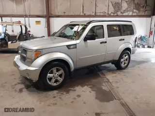 2007 Dodge Nitro SLT with VIN 1D8GU58K97W616455, listed as a IAAI auction lot 41229813 with 199,421 mi miles. Bid and sale history available at carsss.com. Image 2.
