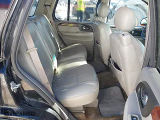 2005 GMC Envoy SLE with VIN 1GKDT13S952288760, listed as a IAAI auction lot 41671656 with 1 mi miles. Bid and sale history available at carsss.com. Image 8.
