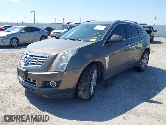 2015 Cadillac SRX Performance Collection with VIN 3GYFNCE31FS598109, listed as a IAAI auction lot 41788267 with 172,488 mi miles and . Bid and sale history available at DreamBid. Image 17.