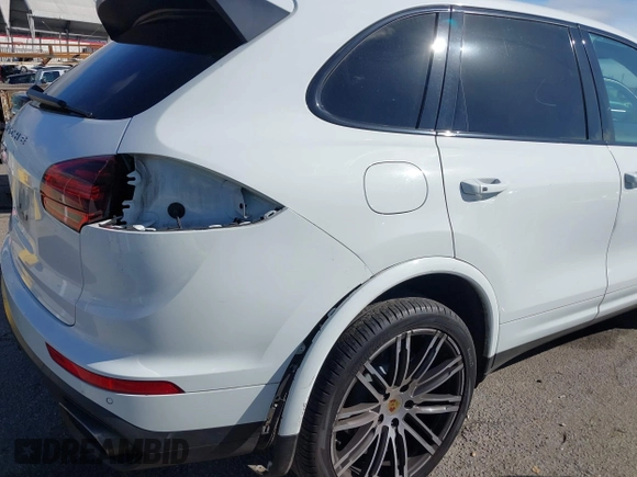 2017 Porsche Cayenne with VIN WP1AA2A23HKA80695, listed as a IAAI auction lot 41532359 with 71,628 mi miles. Bid and sale history available at carsss.com. Image 6.