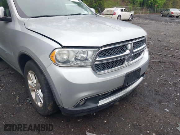 2013 Dodge Durango Crew with VIN 1C4SDJDT8DC565608, listed as a IAAI auction lot 42181773 with 161,485 mi miles and . Bid and sale history available at DreamBid. Image 6.
