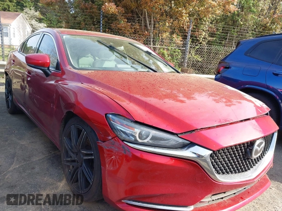 2018 Mazda 6 Grand Touring Reserve with VIN JM1GL1WY9J1308966, listed as a IAAI auction lot 41928044 with 113,488 mi miles and . Bid and sale history available at DreamBid. Image 1.