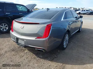 2019 Cadillac XTS Luxury with VIN 2G61M5S35K9125097, listed as a IAAI auction lot 41749076 with 102,585 mi miles. Bid and sale history available at carsss.com. Image 4.
