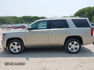 2015 Chevrolet Tahoe LTZ z VIN 1GNSKCKC0FR113647, wystawiony jako IAAI lot #42288089 z przebiegiem 113 322 mil mil oraz . Historia ofert i sprzedaży dostępna na DreamBid. Obrazek 14.