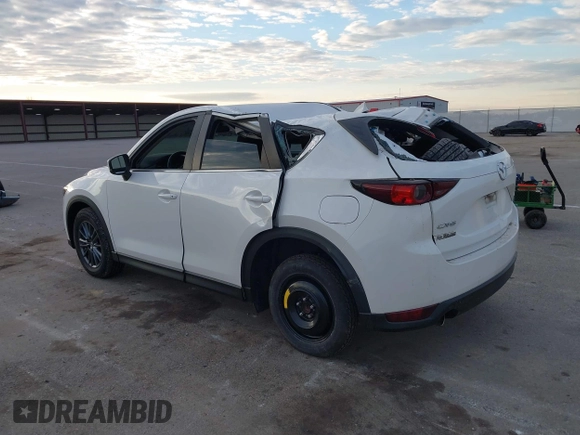 2019 Mazda CX-5 Sport with VIN JM3KFABMXK1655302, listed as a IAAI auction lot 41901293 with 140,369 mi miles and . Bid and sale history available at DreamBid. Image 3.