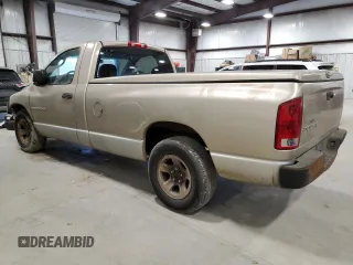 2002 Dodge 1500 with VIN 1D7HA16K52J263179, listed as a Copart auction lot 86451004 with 317,721 mi miles and Salvage Title. Bid and sale history available at DreamBid. Image 2.
