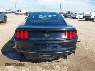 2015 Ford Mustang EcoBoost z VIN 1FA6P8TH9F5355840, wystawiony jako IAAI lot #42552910 z przebiegiem 96 422 mil mil oraz . Historia ofert i sprzedaży dostępna na DreamBid. Obrazek 16.