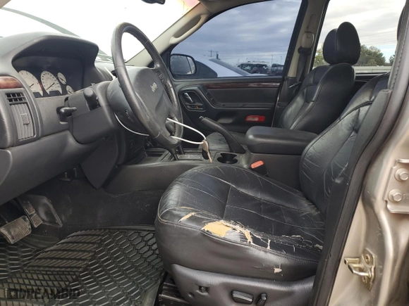 2003 Jeep Grand Cherokee Limited with VIN 1J8GW58N43C546645, listed as a Copart auction lot 77046984 with 186,039 mi miles and Clean Title. Bid and sale history available at carsss.com. Image 7.