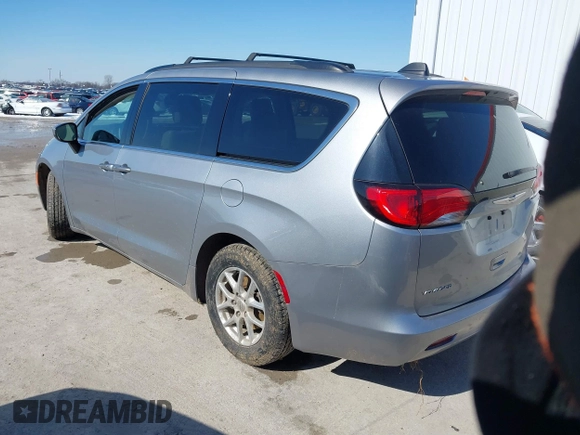 2021 Chrysler Voyager LXI with VIN 2C4RC1DG7MR566518, listed as a IAAI auction lot 41624729 with 93,489 mi miles. Bid and sale history available at carsss.com. Image 3.