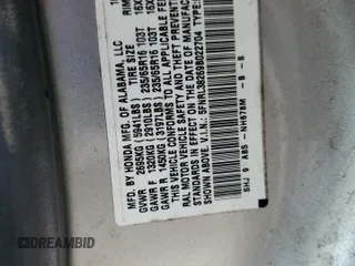 2009 Honda Odyssey LX z VIN 5FNRL38269B022704, wystawiony jako Copart lot #57833865 z przebiegiem Nie podano mil oraz Czysty tytuł • Clean title. Historia ofert i sprzedaży dostępna na DreamBid. Obrazek 13.