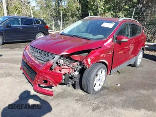 2016 Ford Escape Titanium with VIN 1FMCU0J93GUB01191, listed as a IAAI auction lot 41824183 with 97,241 mi miles. Bid and sale history available at carsss.com. Image 2.