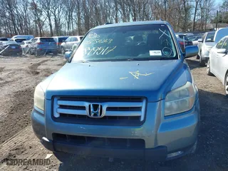 2006 Honda Pilot EX-L with VIN 5FNYF18536B017084, listed as a IAAI auction lot 41899517 with 999,999 mi miles. Bid and sale history available at carsss.com. Image 6.