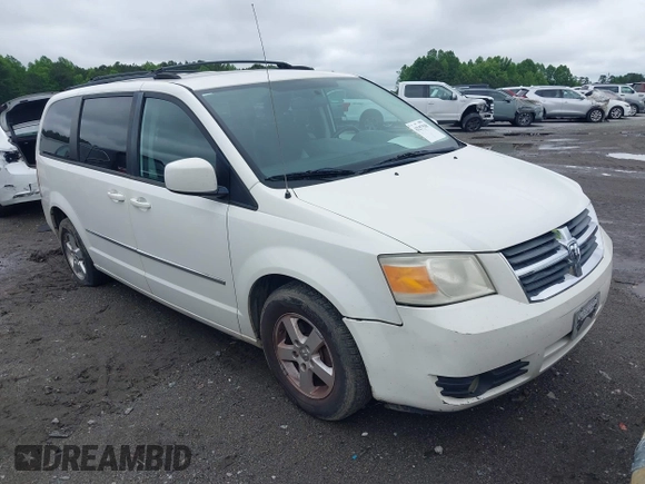 2010 Dodge Grand Caravan SXT z VIN 2D4RN5D18AR247124, wystawiony jako IAAI lot #42257538 z przebiegiem 197 443 mil mil oraz . Historia ofert i sprzedaży dostępna na DreamBid. Obrazek 1.
