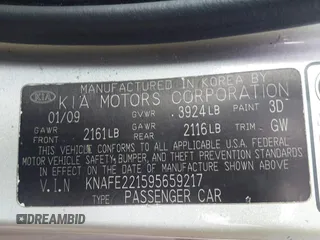2009 Kia Spectra EX with VIN KNAFE221595659217, listed as a IAAI auction lot 42014406 with 140,527 mi miles. Bid and sale history available at carsss.com. Image 9.