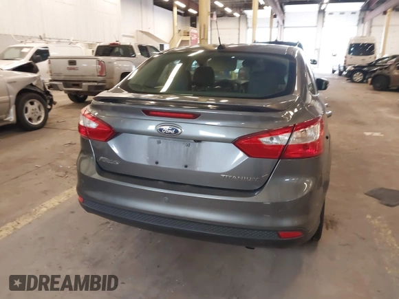 2013 Ford Focus Titanium with VIN 1FADP3J23DL265049, listed as a IAAI auction lot 41765621 with 100,550 mi miles and . Bid and sale history available at carsss.com. Image 16.