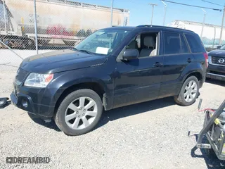 2012 Suzuki Grand Vitara Limited with VIN JS3TD0D79C4101075, listed as a IAAI auction lot 41779558 with 132,863 mi miles. Bid and sale history available at carsss.com. Image 2.