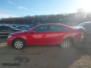 2007 Toyota Camry CE with VIN 4T1BE46K67U010279, listed as a IAAI auction lot 41504065 with 297,916 mi miles. Bid and sale history available at carsss.com. Image 14.