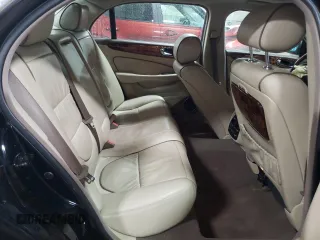 2005 Jaguar XJ Vanden Plas z VIN SAJWA82C65SG44373, wystawiony jako Copart lot #84091444 z przebiegiem 141 993 mil mil oraz Szkoda całkowita • Salvage title. Historia ofert i sprzedaży dostępna na DreamBid. Obrazek 10.