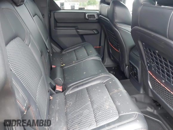 2023 Ford Bronco Raptor with VIN 1FMEE5JR9PLB23222, listed as a IAAI auction lot 42376438 with 7,447 mi miles and . Bid and sale history available at DreamBid. Image 8.