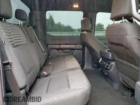 2023 Ford F-150 XL with VIN 1FTEW1CP3PKF86310, listed as a Copart auction lot 60575065 with 29,548 mi miles and Salvage title. Bid and sale history available at DreamBid. Image 10.