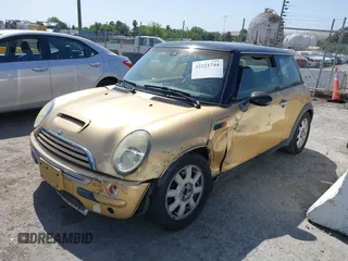 2004 MINI Hardtop with VIN WMWRC33434TJ53276, listed as a IAAI auction lot 42221744 with 195,400 mi miles and . Bid and sale history available at DreamBid. Image 2.