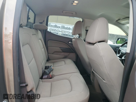 2015 GMC Canyon 4WD SLE with VIN 1GTG6BE38F1263139, listed as a Copart auction lot 75479854 with 124,765 mi miles and Salvage Title. Bid and sale history available at carsss.com. Image 11.