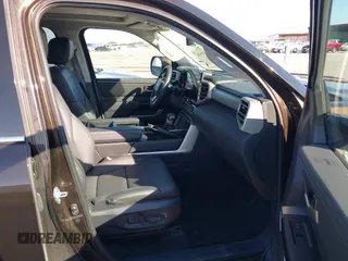 2023 Toyota Tundra Limited Hybrid with VIN 5TFJC5DB7PX032210, listed as a IAAI auction lot 41667443 with 18,390 mi miles and . Bid and sale history available at DreamBid. Image 5.