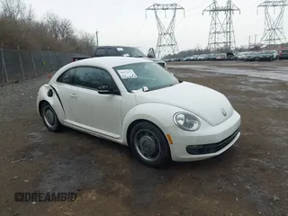 2012 Volkswagen Beetle 2.5L PZEV with VIN 3VWHP7AT9CM622739, listed as a IAAI auction lot 41674272 with 127,932 mi miles. Bid and sale history available at carsss.com. Image 1.