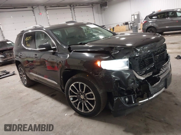 2020 GMC Acadia Denali with VIN 1GKKNXLS9LZ176047, listed as a IAAI auction lot 41936459 with 70,005 mi miles. Bid and sale history available at carsss.com. Image 1.