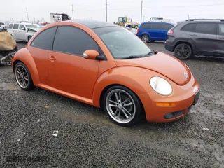 2010 Volkswagen New Beetle Coupe with VIN 3VWRG3AG3AM024689, listed as a IAAI auction lot 41037756 with 102,180 mi miles. Bid and sale history available at carsss.com. Image 1.