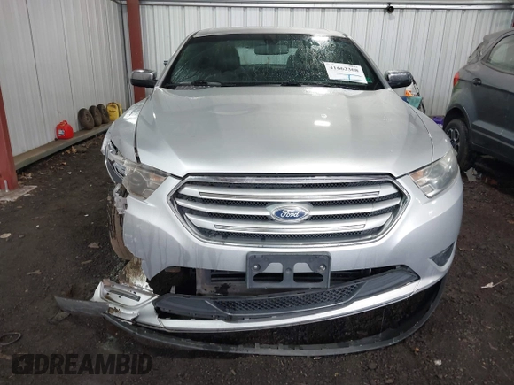 2014 Ford Taurus Limited with VIN 1FAHP2F81EG101351, listed as a IAAI auction lot 41662308 with 139,542 mi miles. Bid and sale history available at carsss.com. Image 12.